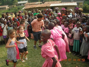 Our youngest volunteers dance the Kiga dance