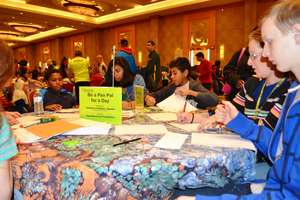 Jan - Penpals get busy writing letters on MLK Day