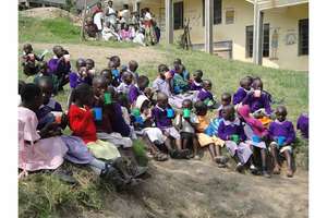 Children having porridge at 10:30am
