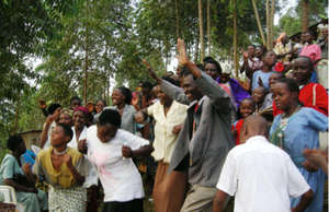 Alex (center) dances in Celebration at School