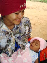 New mother, Nun, with her healthy baby