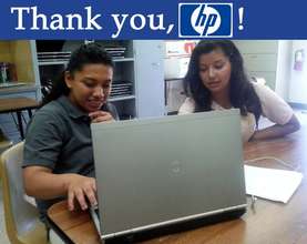 Students using one of our new HP laptops