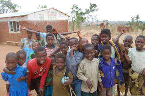 Kids in the program in front of the orphanage