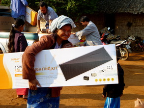 One of the residents and her new solar panel