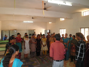 Field staff addressing potential candidates