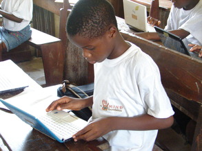 MIND Program: Campbell working on his laptop