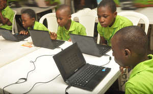 MIND kids working on their laptop during the camp