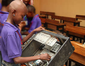 MIND kid assembling a central processing unit