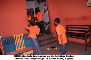 Helping to clean up the Orphanage