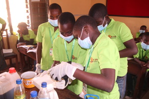 MIND kids working on their liquid soap project