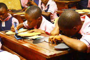 MIND kids working on their shoe project