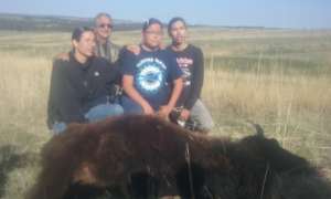 Supporting youth during manhood ceremony