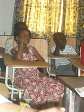 Potential students watching the presentation