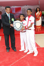 Thomba + Umesh collecting their prize for Football
