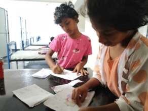 Children making cards for their loved ones