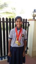 Pooja with her gold medals