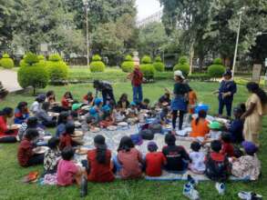 Children at the Park enjoying their snacks