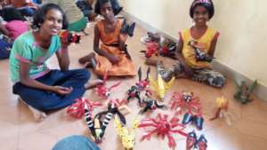 Showing off their artefacts made of plastic bottle