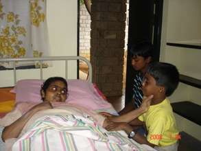 Shoba with her sons a few days before she expired