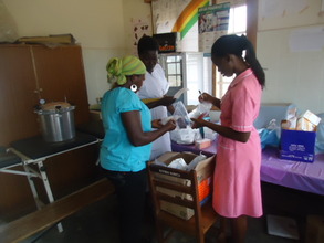 A health facility unpacks new supplies