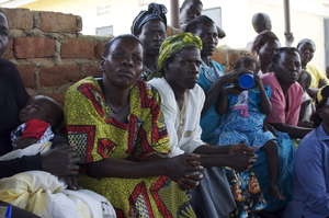 HIV+ mothers in a women's group meeting at Olwal