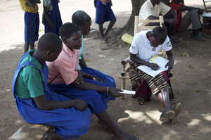 Beatrice working at an HIV blood screening