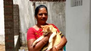Gita with one of a disabled shelter cat