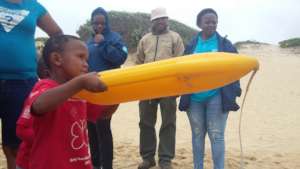 Little Elakhe playing lifeguard