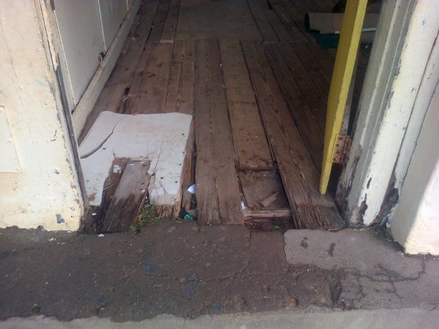 A desperate looking floor awaiting urgent repair