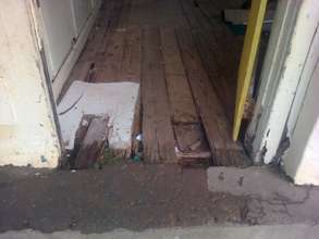 A desperate looking floor awaiting urgent repair
