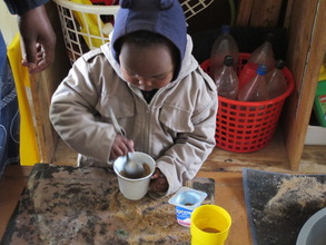A little boy who loves to be busy