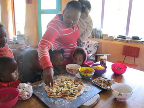 Master Chefs closely observing first pizza making