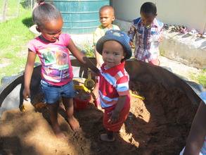 A spade, water and mud.......yum!