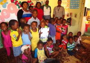 Proud staff and children