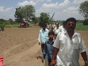 Mayor leading the village tour