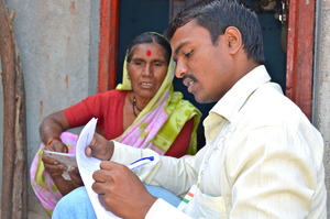Mobile Health Team worker takes village survey