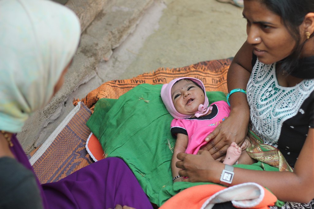 Dr. Pushpa performing routine post-natal checkup