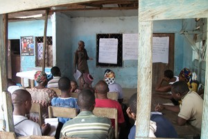 Aldous teaching about pig-rearing