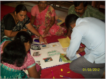 Teachers absorbed in a training session
