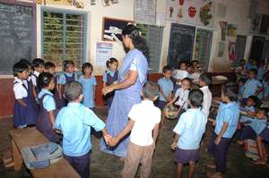 Govt school teacher with children