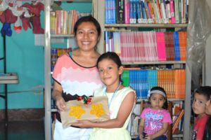 Maria Teresa accepting reading award