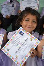 Jakelin graduates from Pre-K at Compartir!