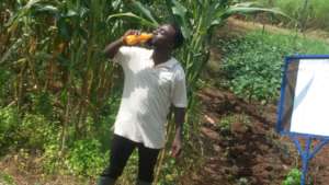 Benjamin enjoying OFSP juice