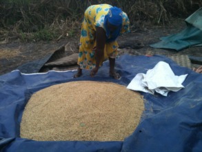 Veronica with rice harvested from her family farm