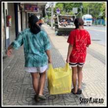 Walking home with groceries from Step Ahead office