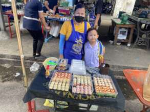 Sutanee selling Sushi