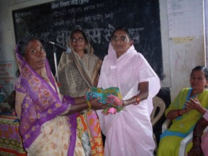 Mangala being felicitated by another village woman