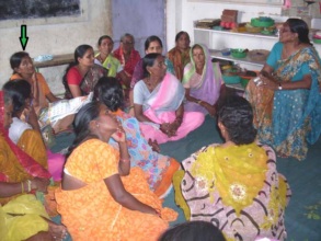 Mangala & women discussing issues of the village