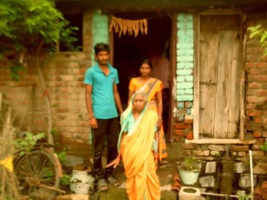 Kamal with her mother and her sister's son at home