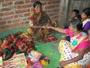 Zaida happly trying sizes with bangles on women